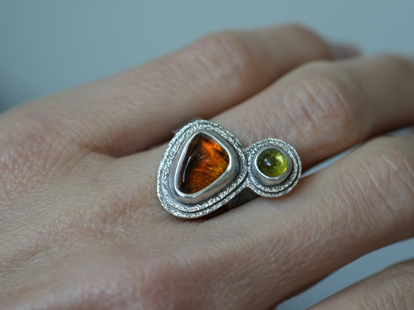 Sterling silver, garnet and tourmaline satellite ring, size 6