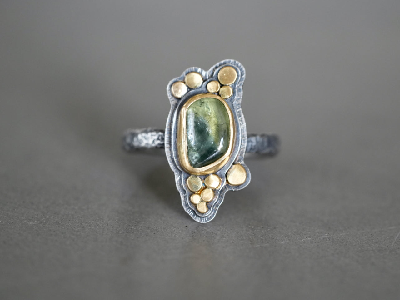 Carved sapphire and gold ring, size 6