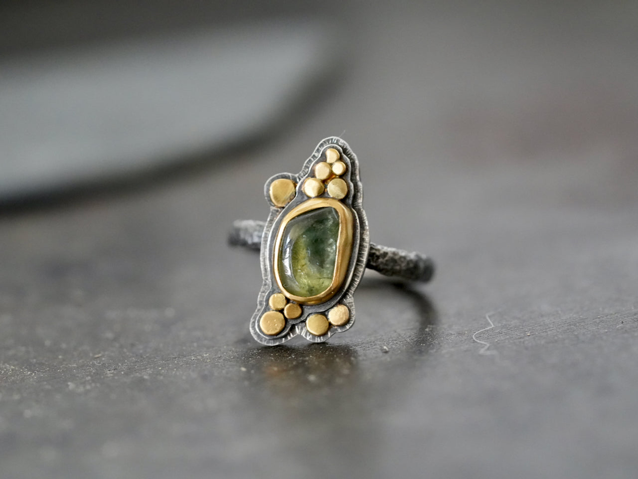Carved sapphire and gold ring, size 6