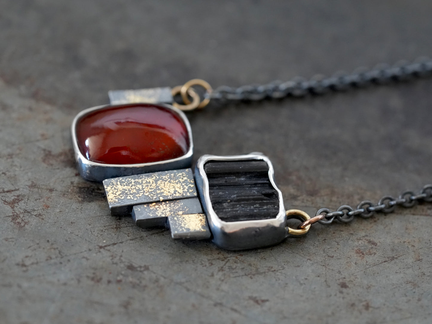 Statement garnet and tourmaline necklace with gold accents