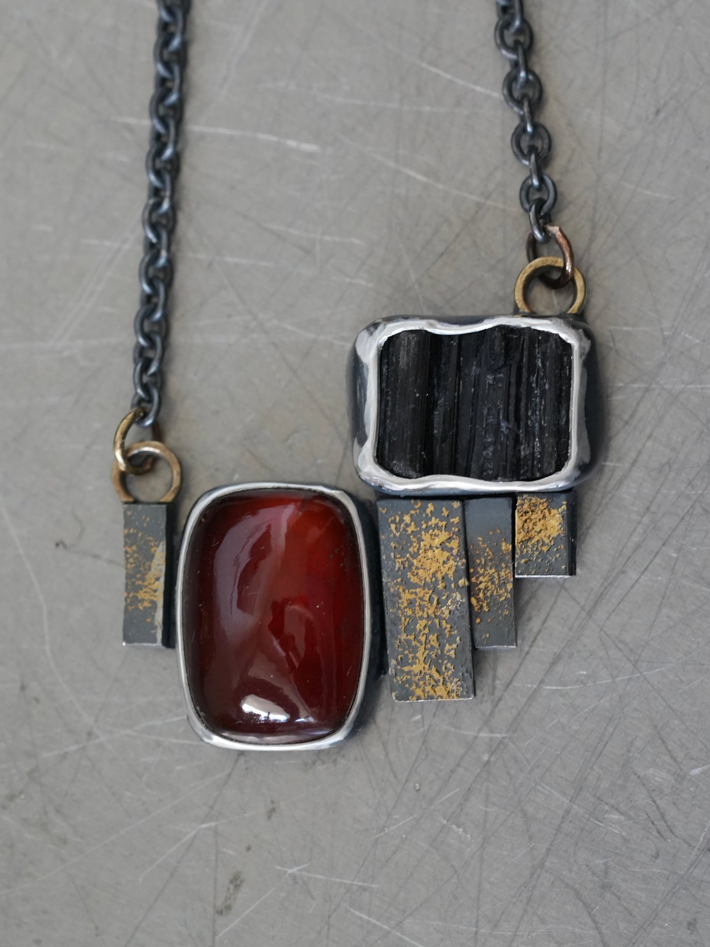 Statement garnet and tourmaline necklace with gold accents