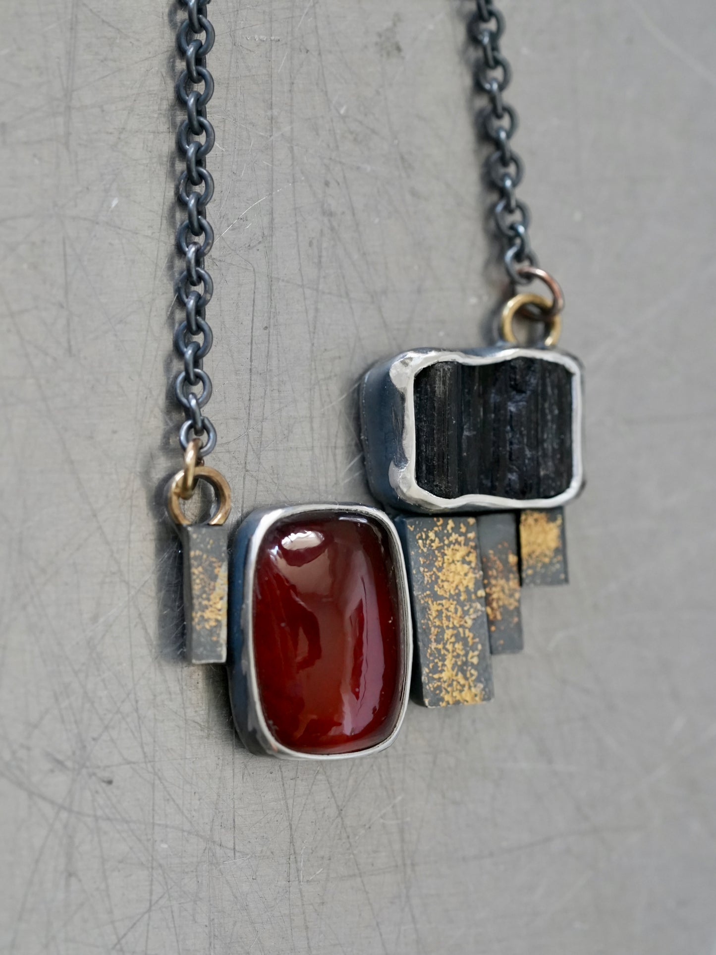 Statement garnet and tourmaline necklace with gold accents
