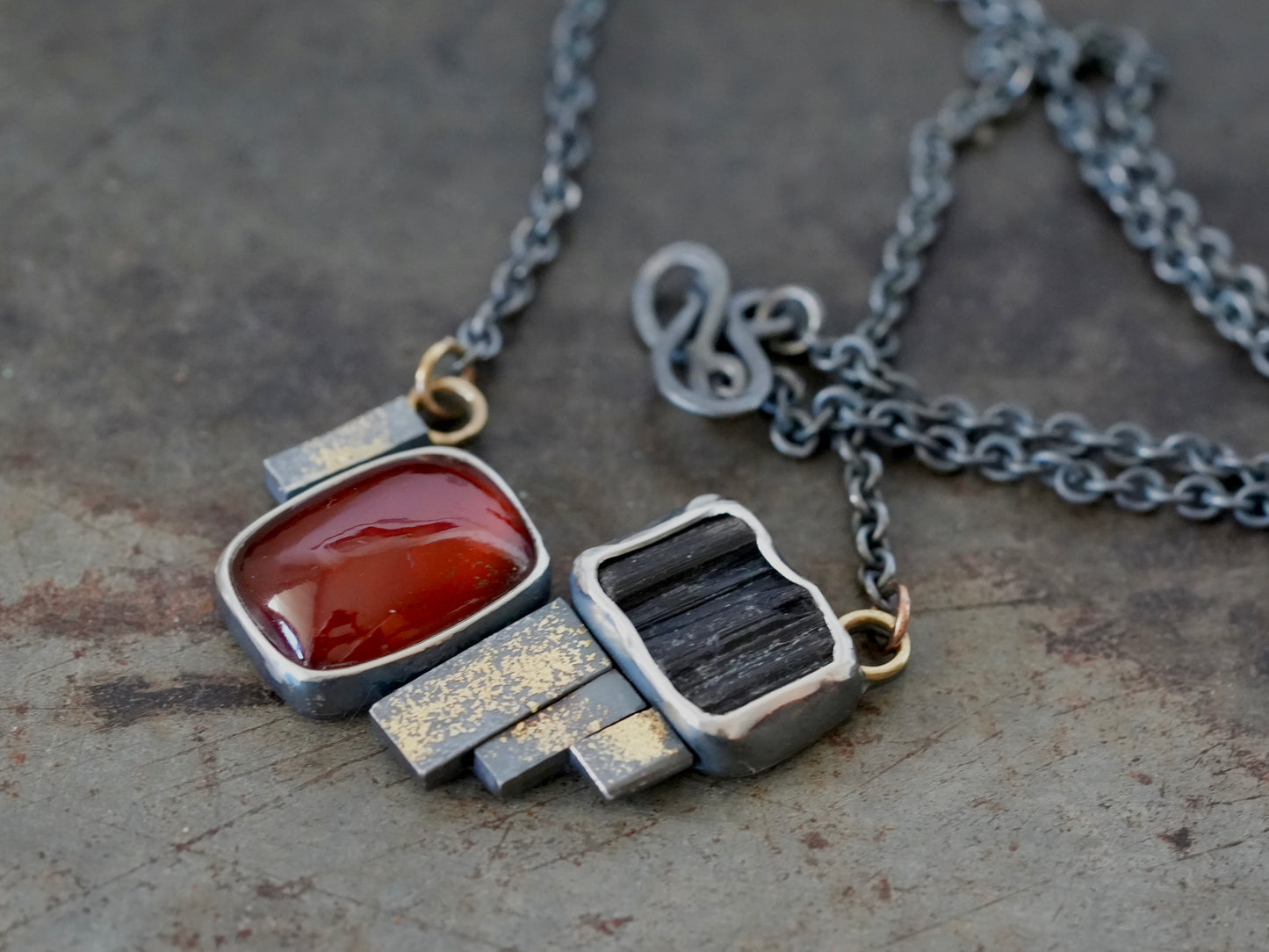 Statement garnet and tourmaline necklace with gold accents
