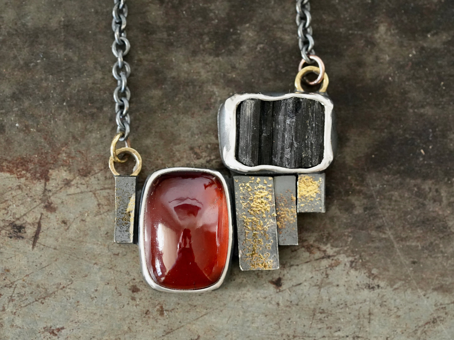 Statement garnet and tourmaline necklace with gold accents