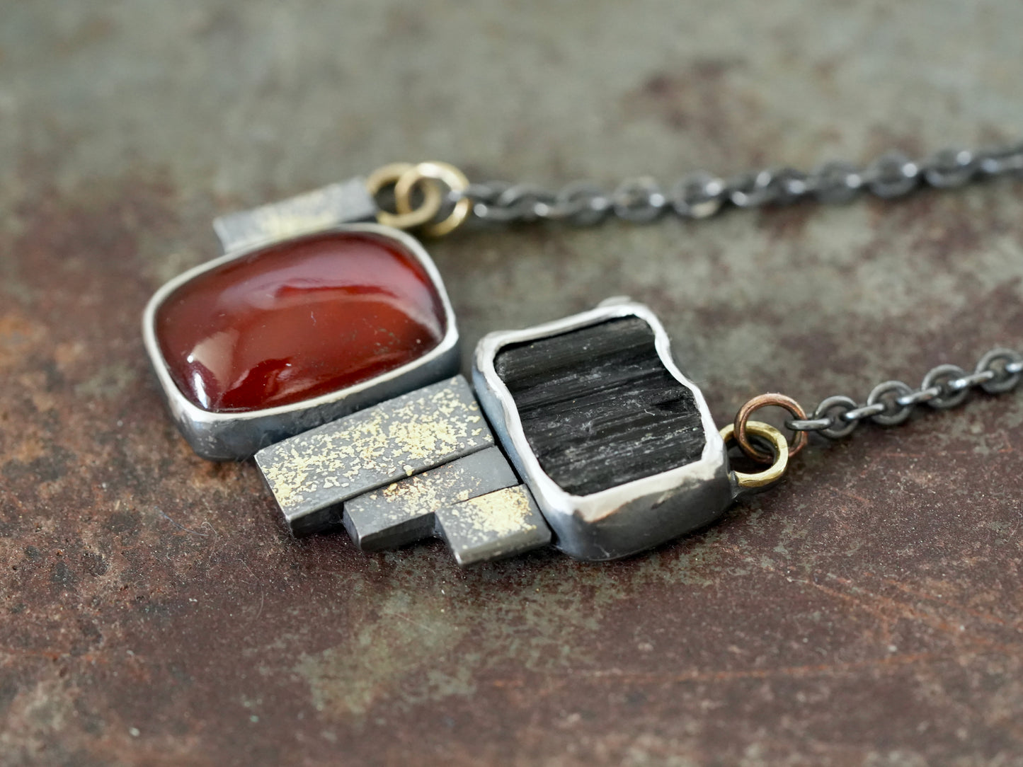 Statement garnet and tourmaline necklace with gold accents