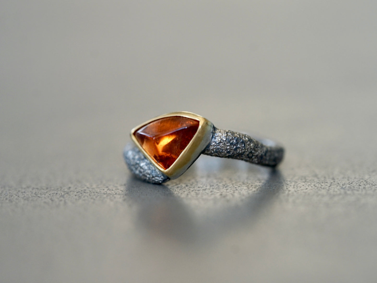 Fire ring, garnet, gold and sterling silver, size 6.5