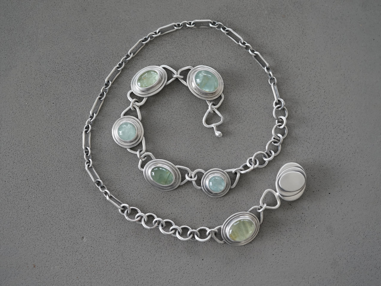 Aquamarine statement necklace with key lock clasp