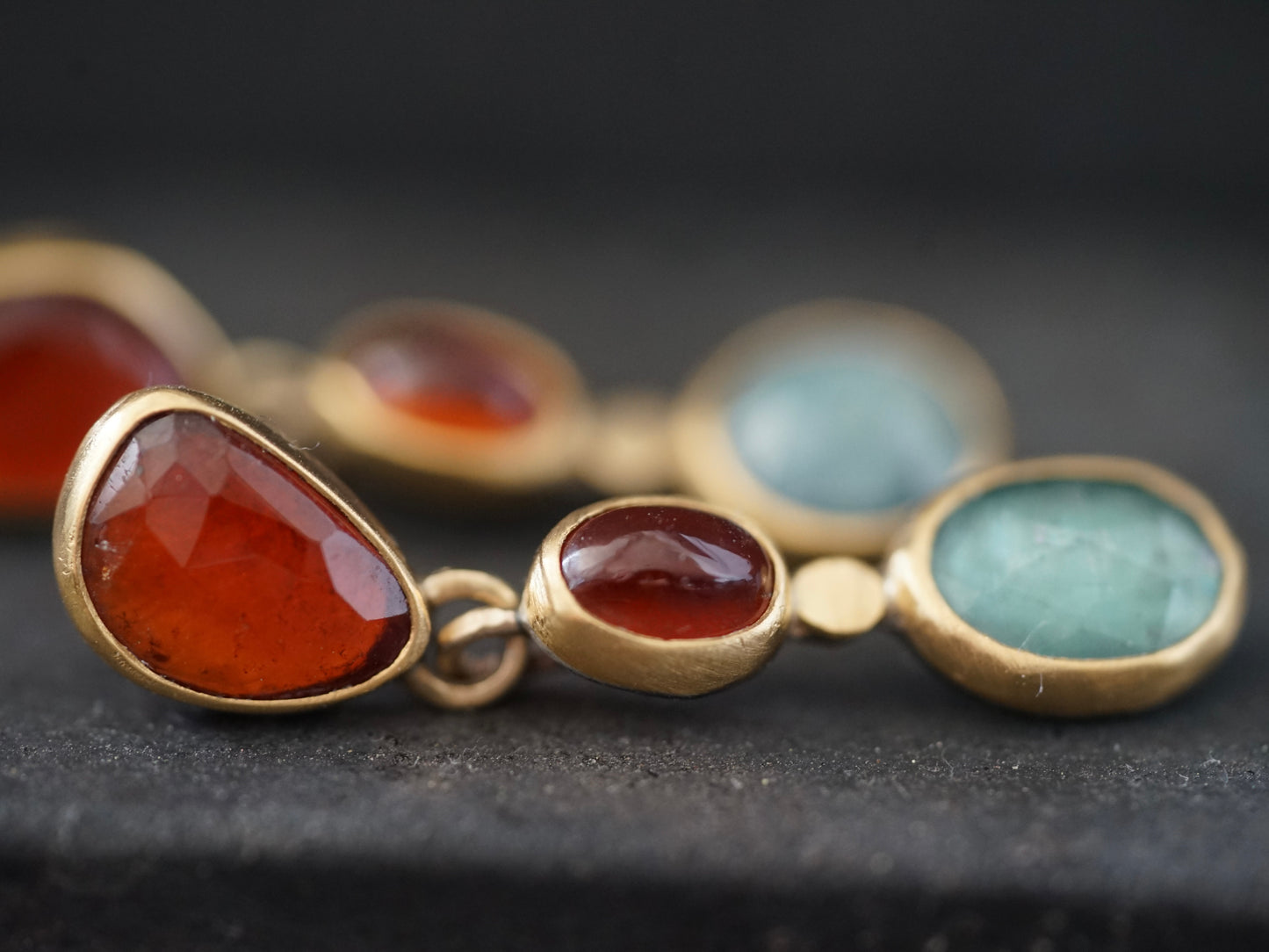 Exquisite garnet and kyanite dangly post earrings