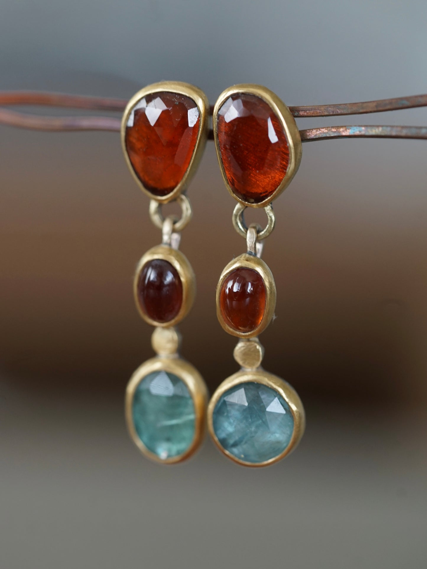 Exquisite garnet and kyanite dangly post earrings
