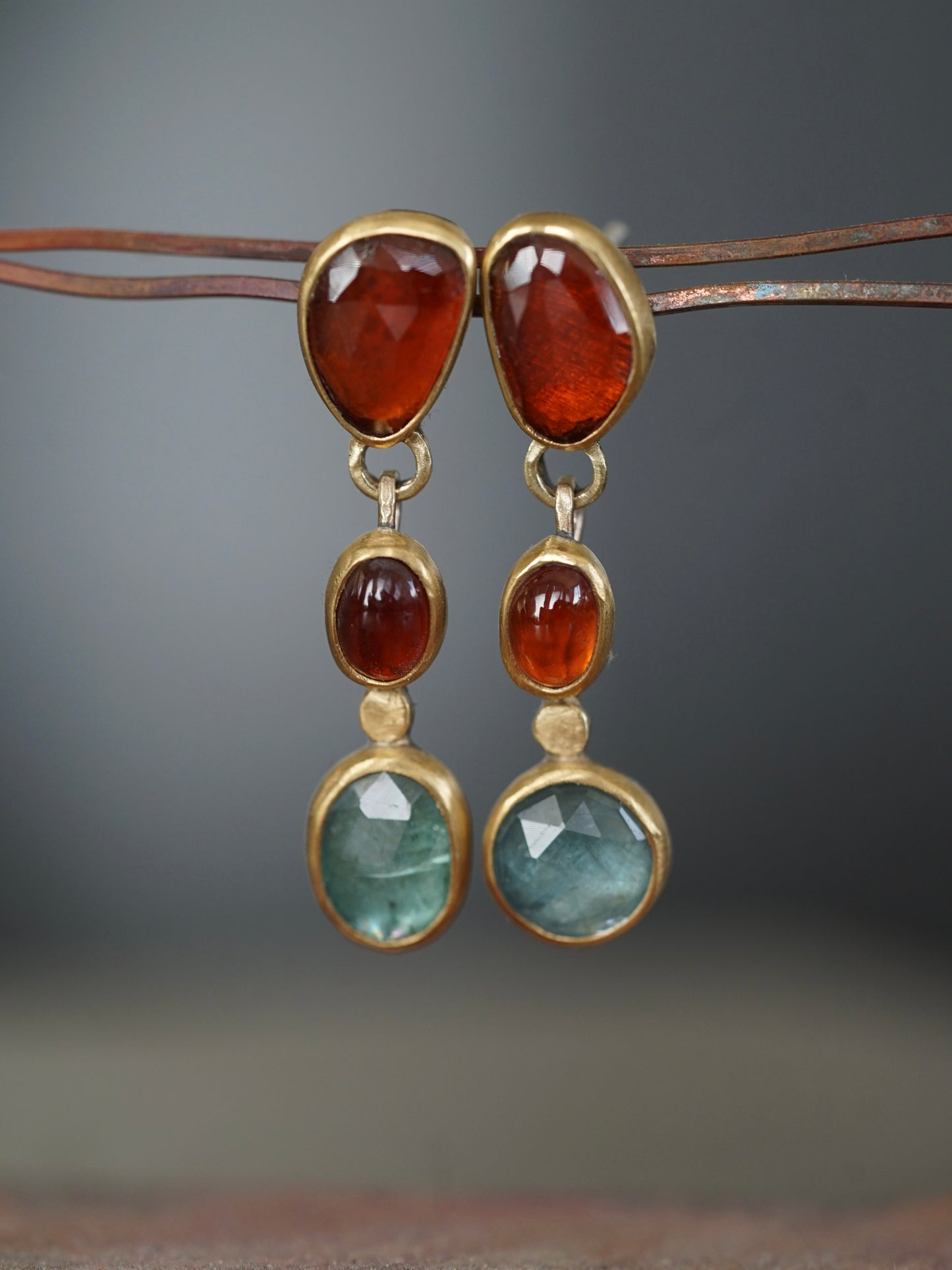 Exquisite garnet and kyanite dangly post earrings