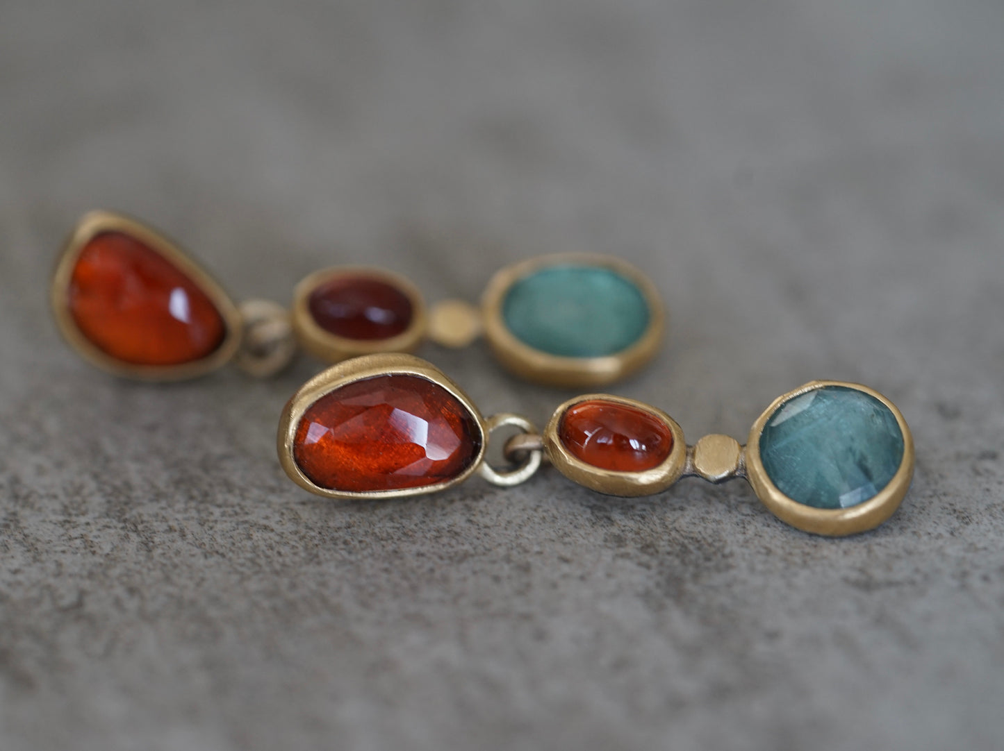Exquisite garnet and kyanite dangly post earrings