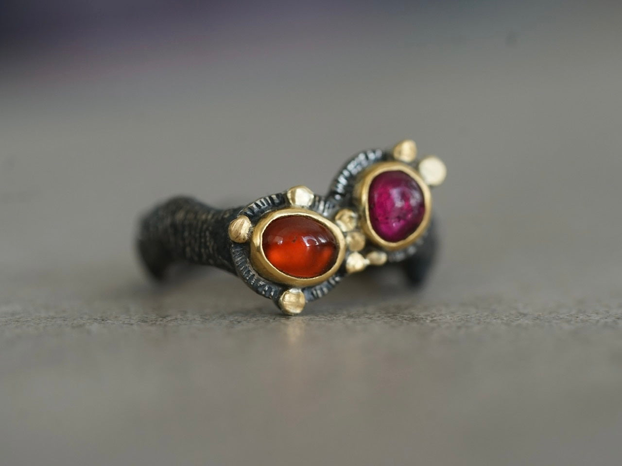 Gold embellished garnet and tourmaline ring, size 6.25