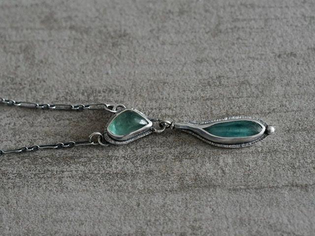 Carved teal blue tourmaline necklace