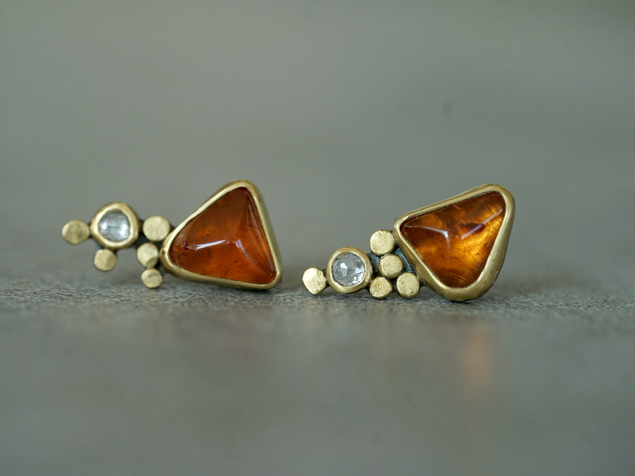 Hessonite garnet and diamond post earrings