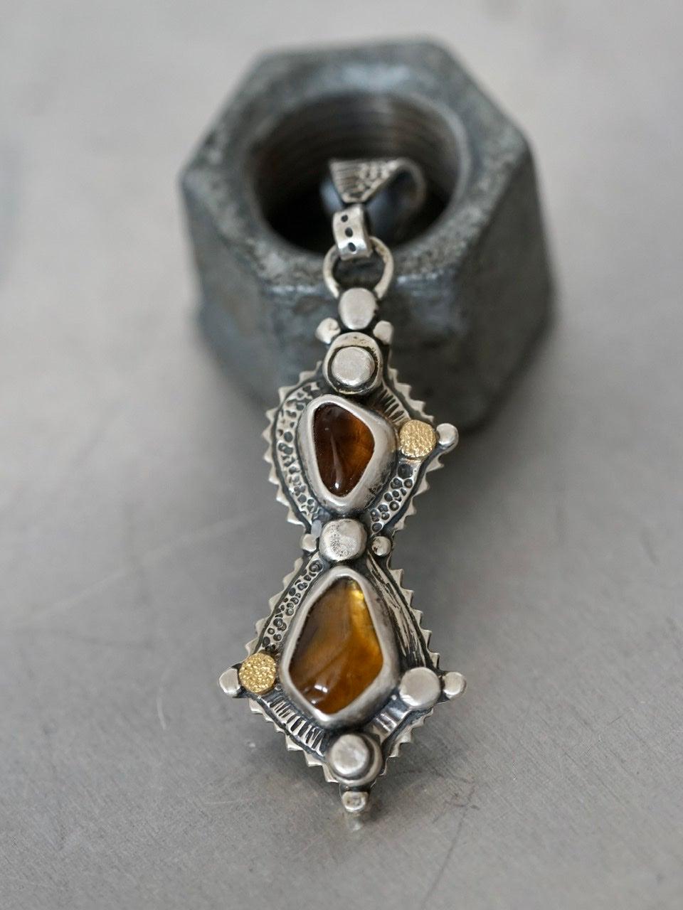 Honey and molasses pendant