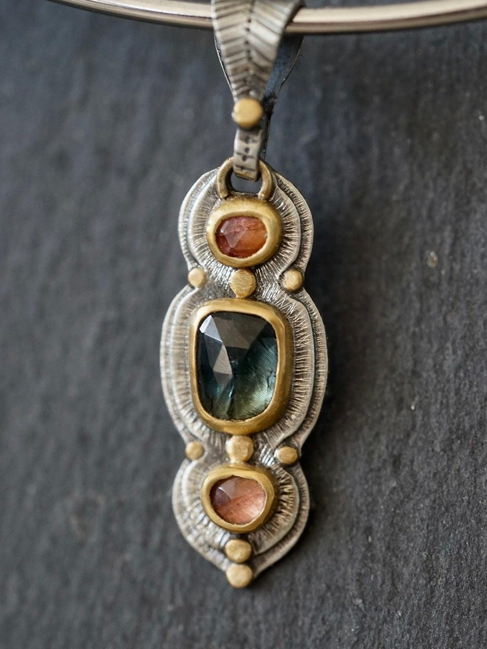 Sapphire and spinel pendant with 22k gold accents