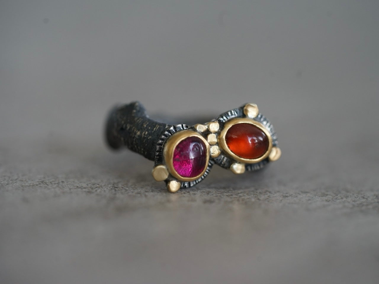 Gold embellished garnet and tourmaline ring, size 6.25