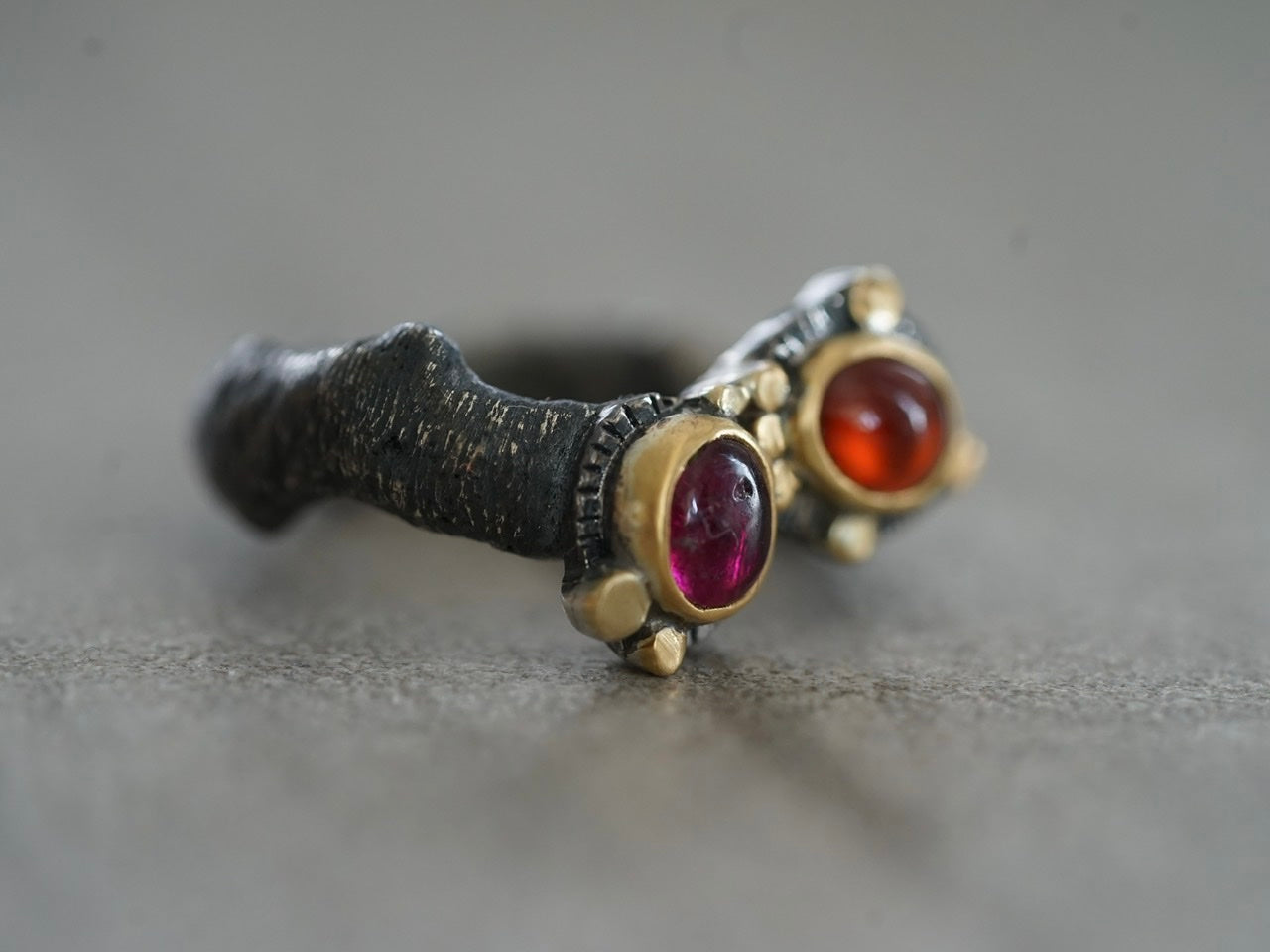 Gold embellished garnet and tourmaline ring, size 6.25
