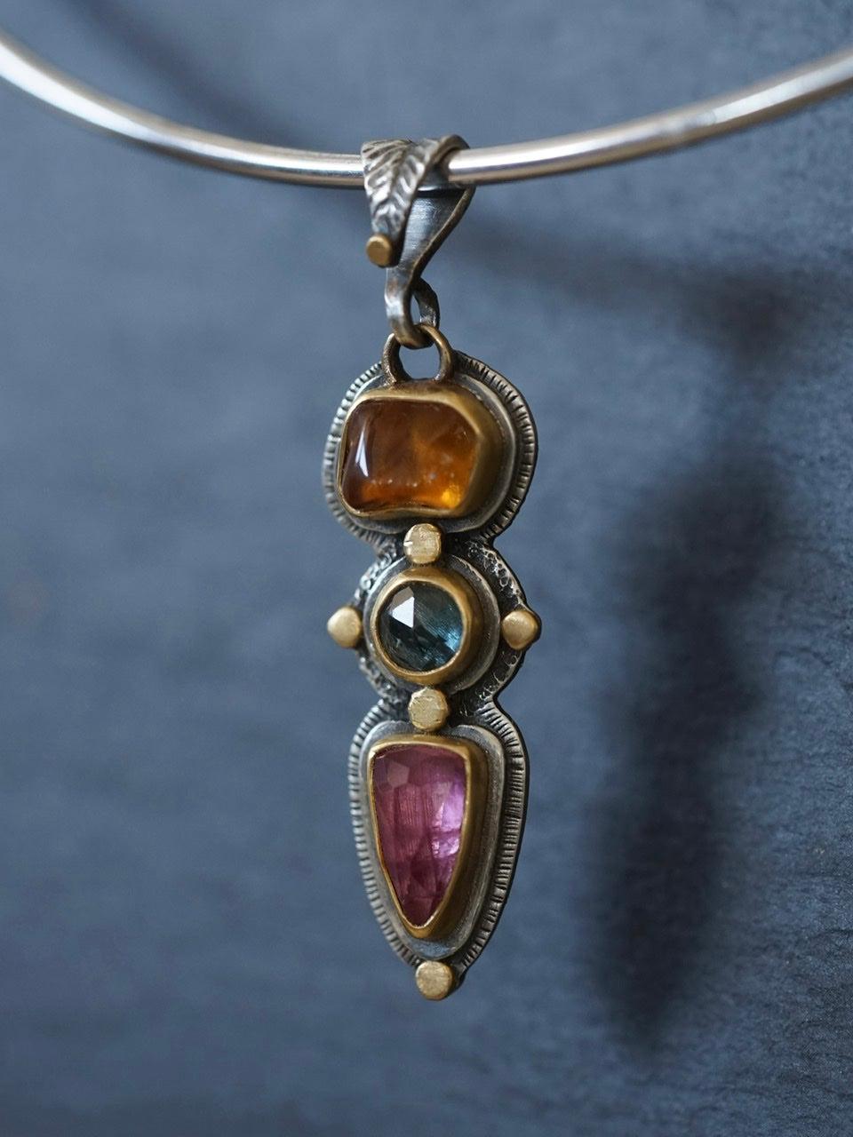 Tourmaline and sapphire pendant with gold accents