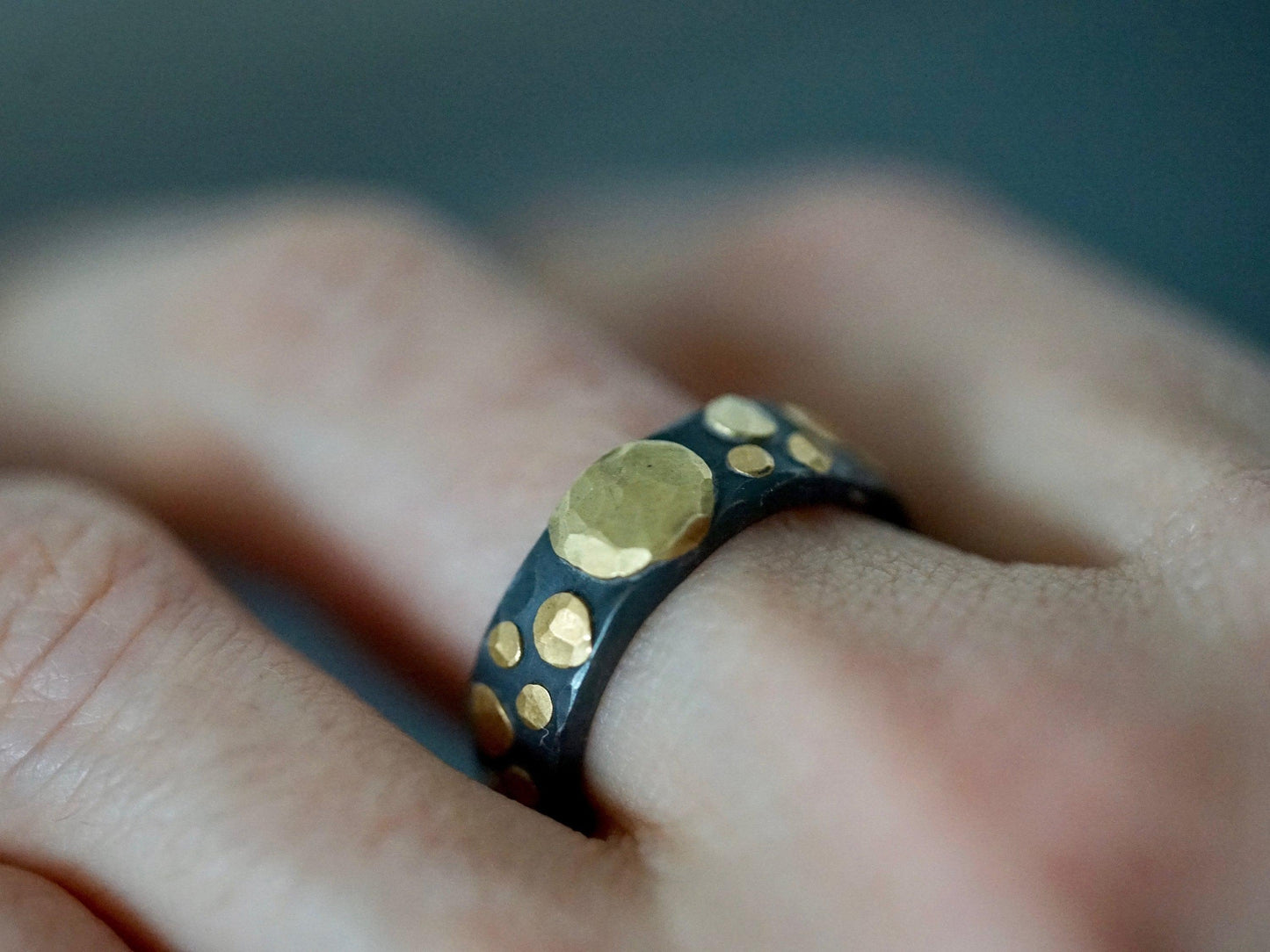 Gold and black ring, size 8