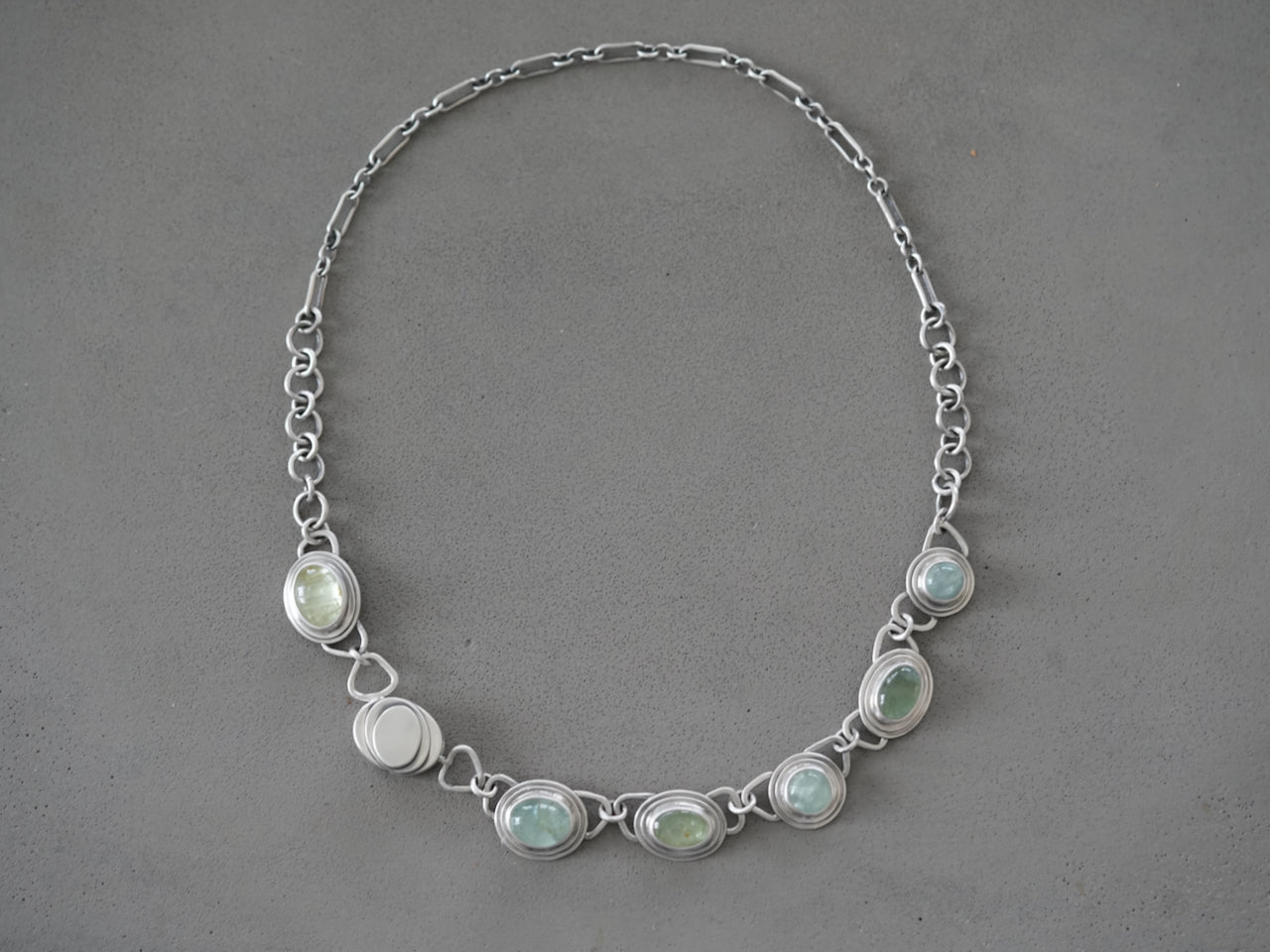 Aquamarine statement necklace with key lock clasp