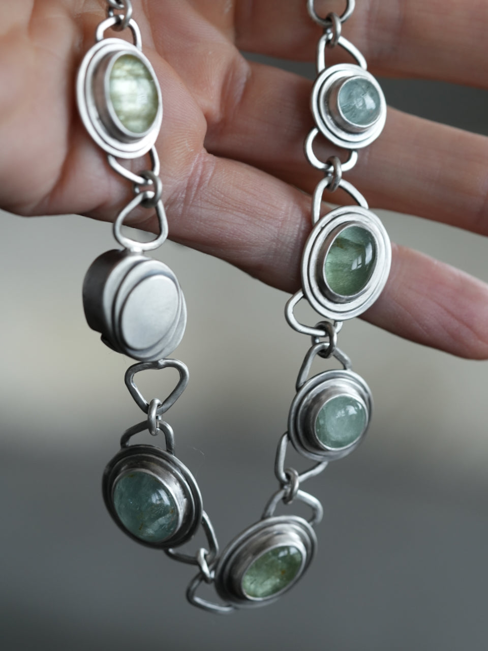 Aquamarine statement necklace with key lock clasp