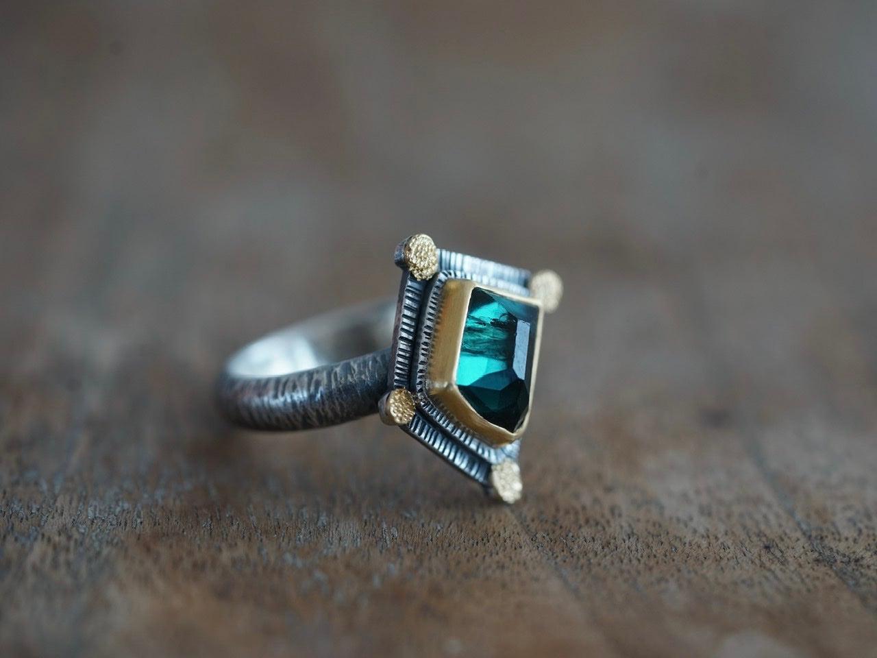 Irregularly shaped, teal blue, faceted tourmaline and 22k gold statement ring, size 7.75
