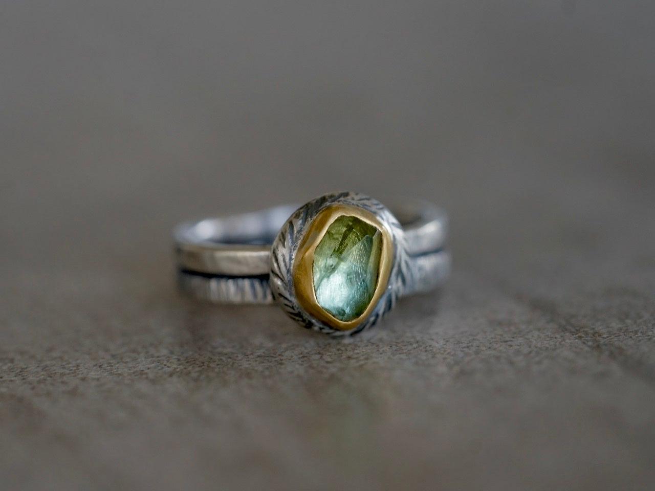 Green tourmaline and 22 k gold swirl ring, size 7.25