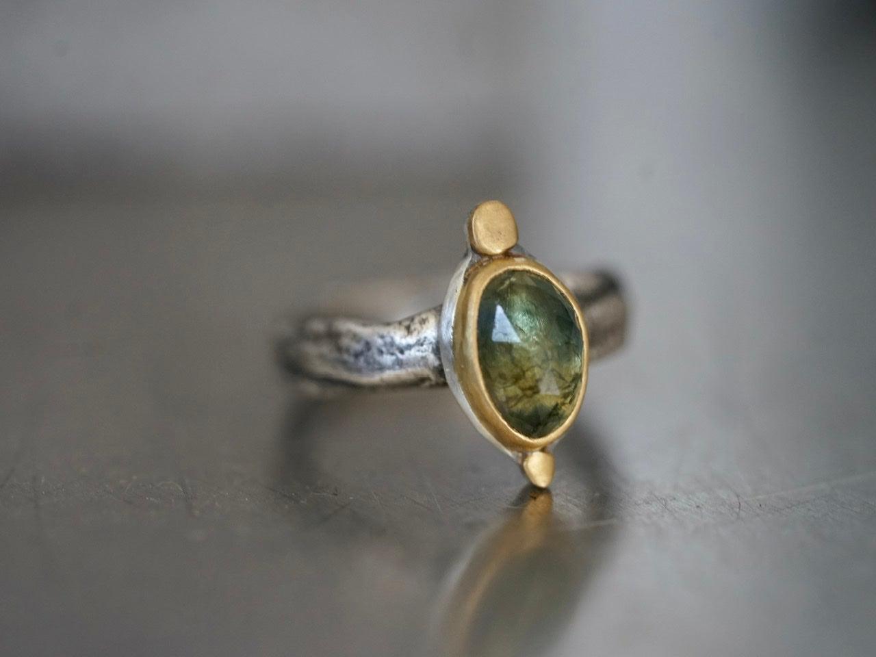 Elegant semi-translucent green sapphire and 22k gold ring, size 7