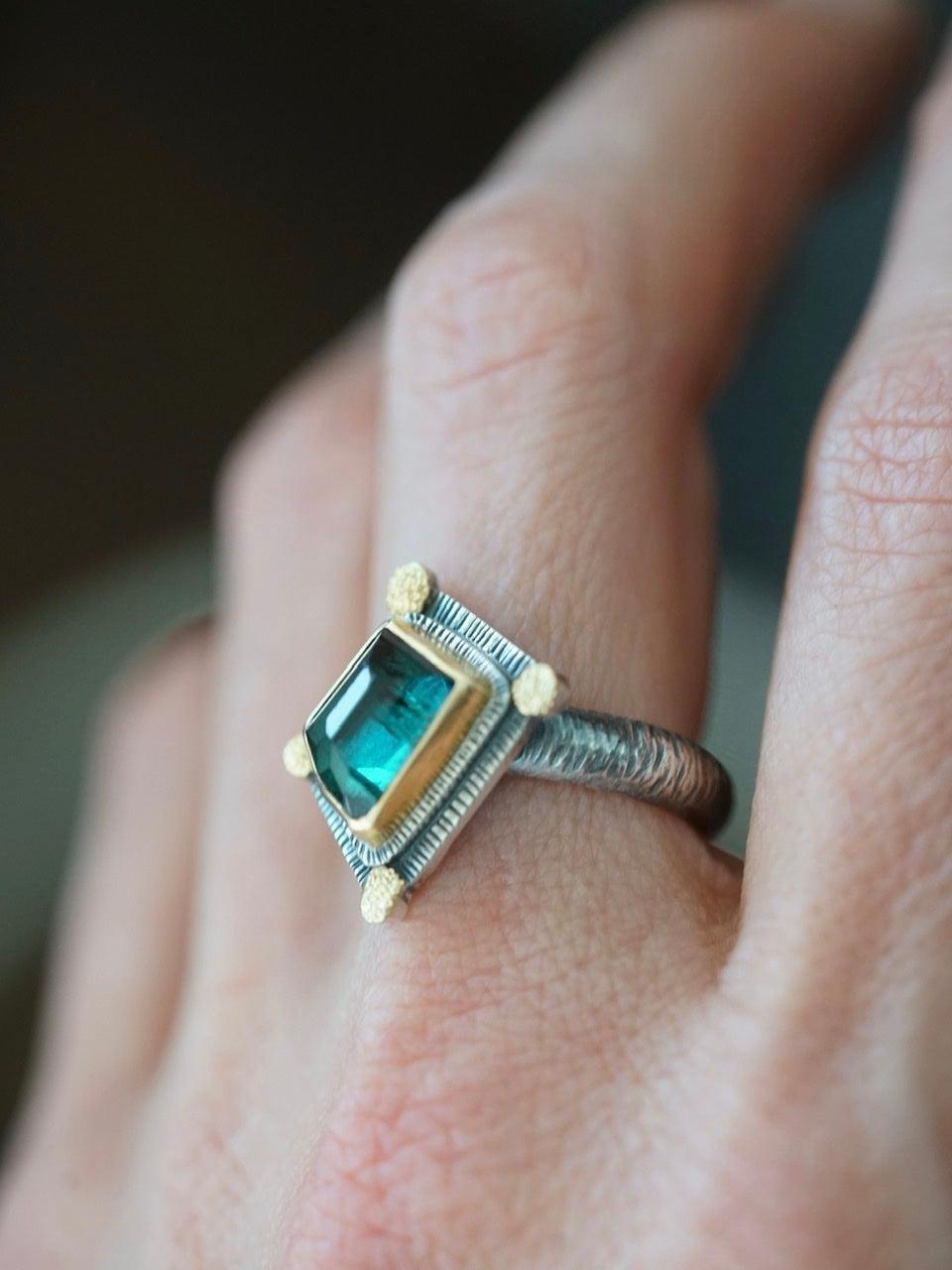 Irregularly shaped, teal blue, faceted tourmaline and 22k gold statement ring, size 7.75