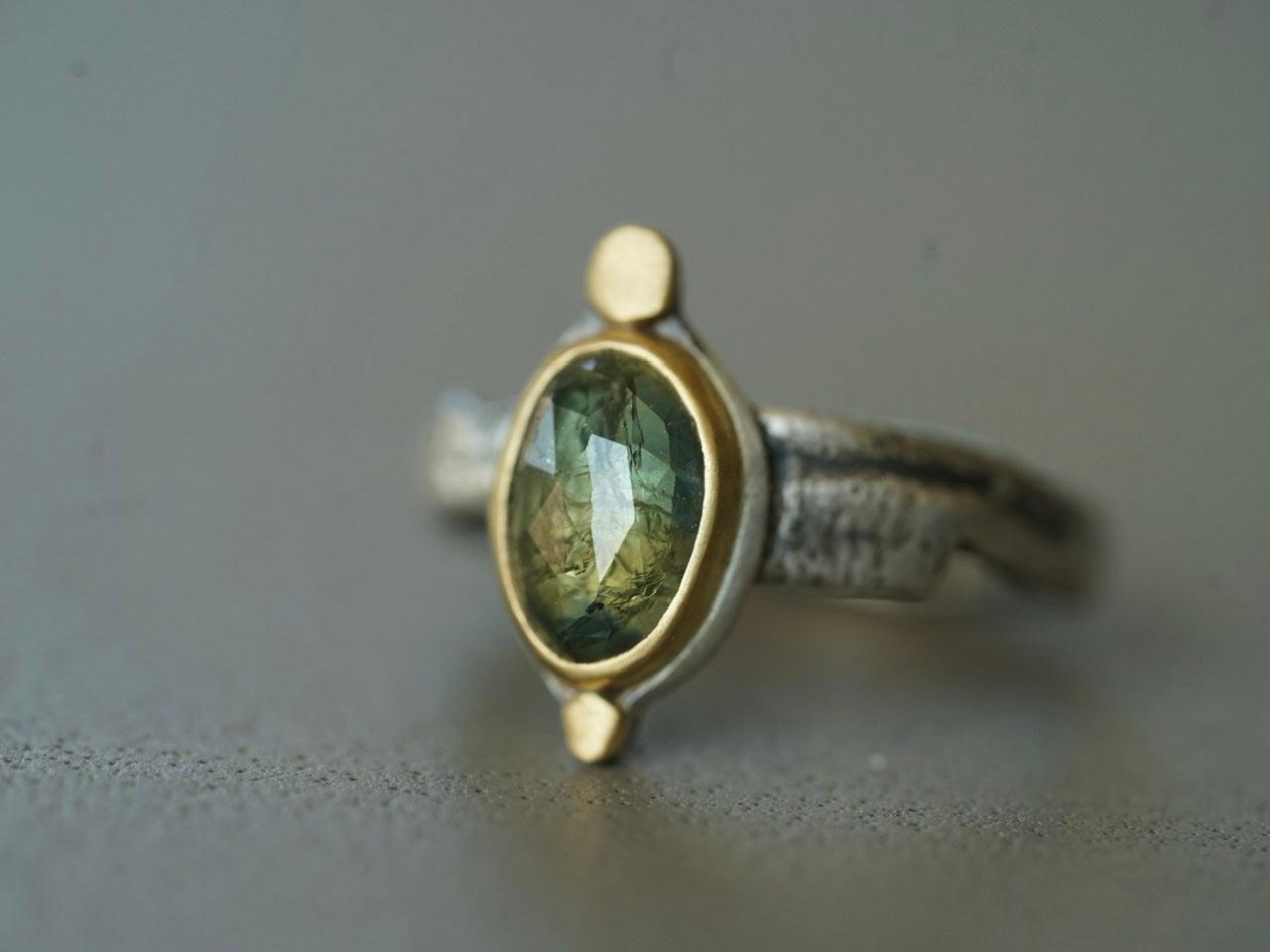 Elegant semi-translucent green sapphire and 22k gold ring, size 7