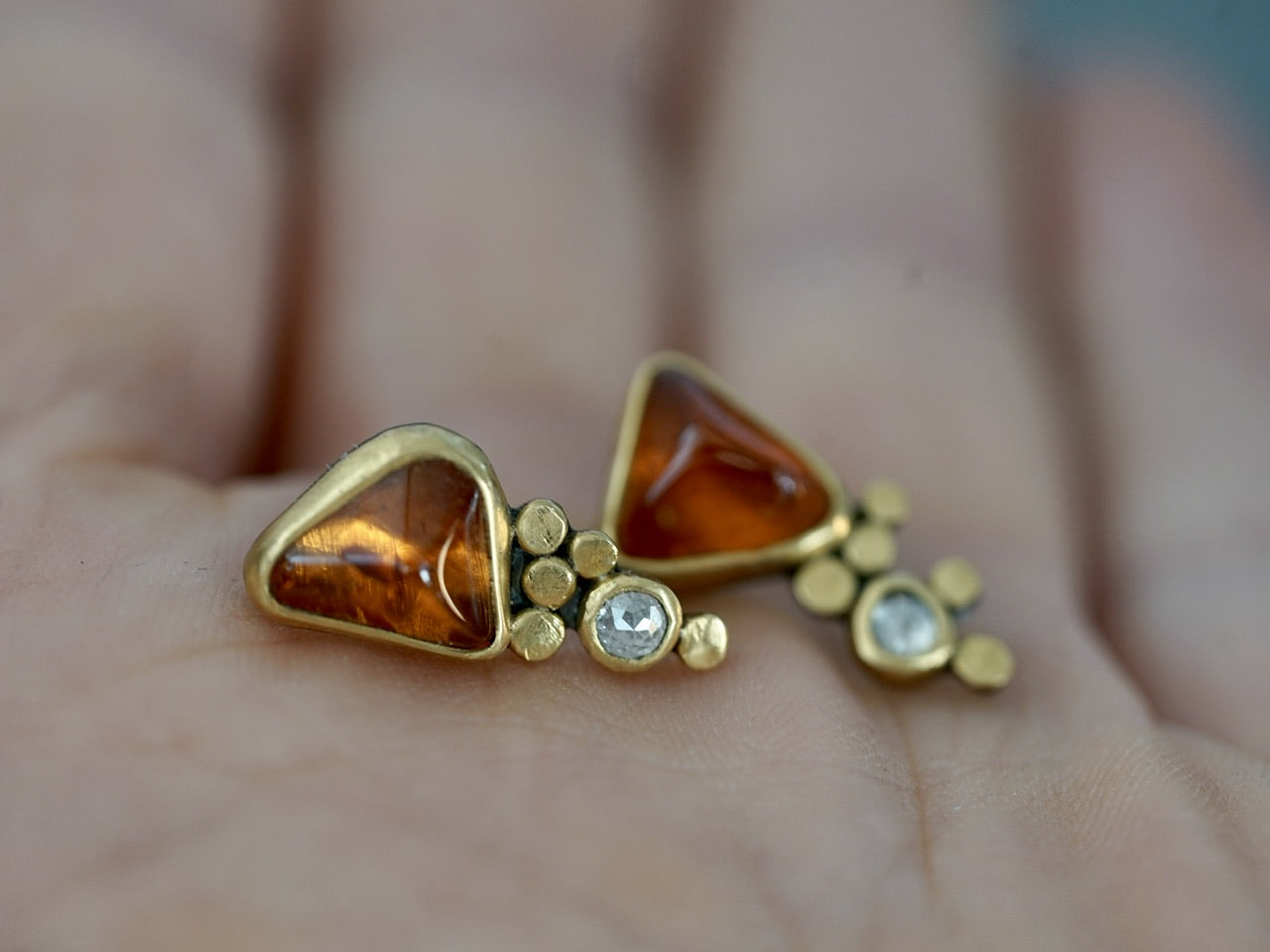 Hessonite garnet and diamond post earrings