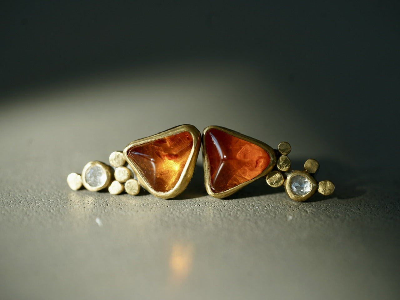 Hessonite garnet and diamond post earrings