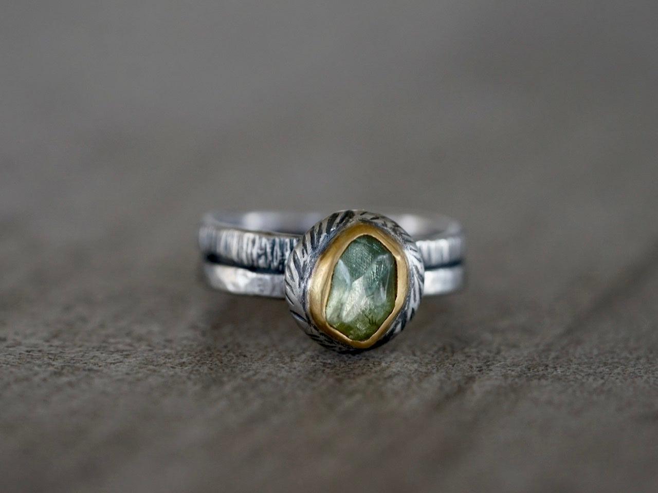 Green tourmaline and 22 k gold swirl ring, size 7.25