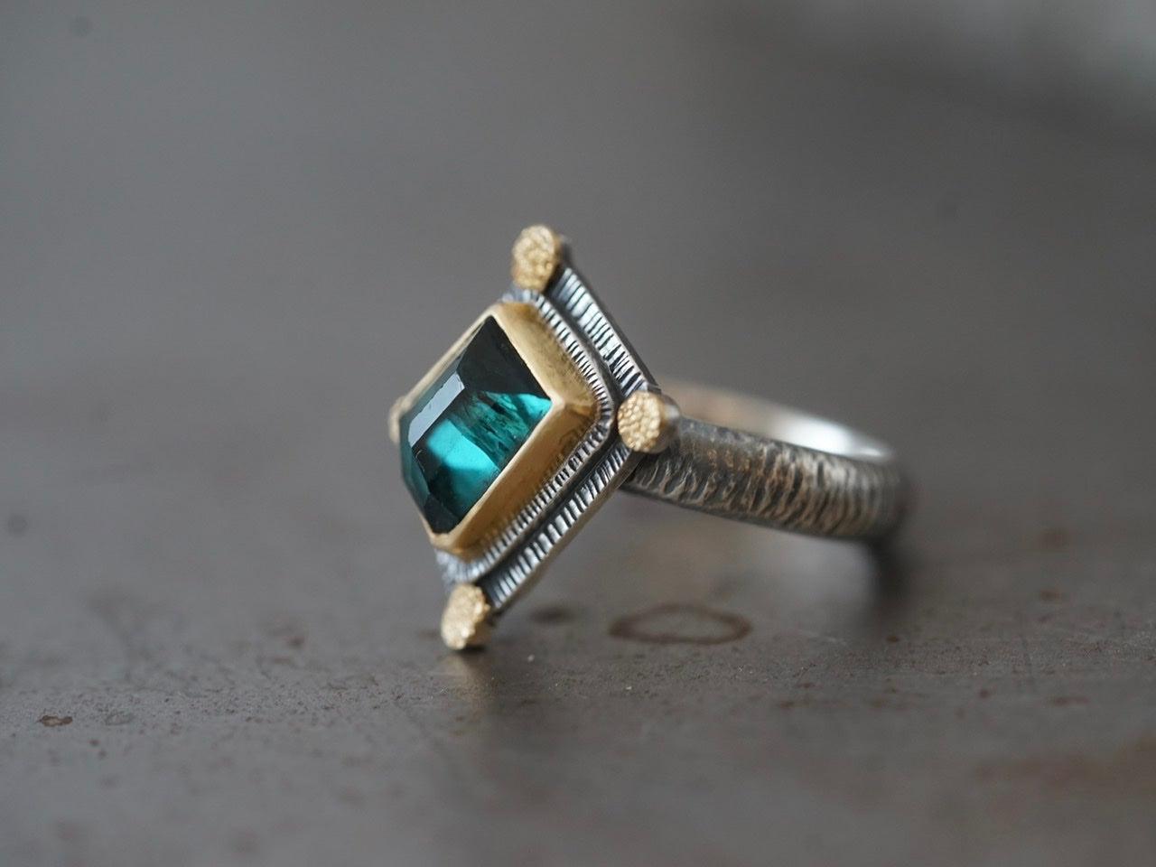 Irregularly shaped, teal blue, faceted tourmaline and 22k gold statement ring, size 7.75