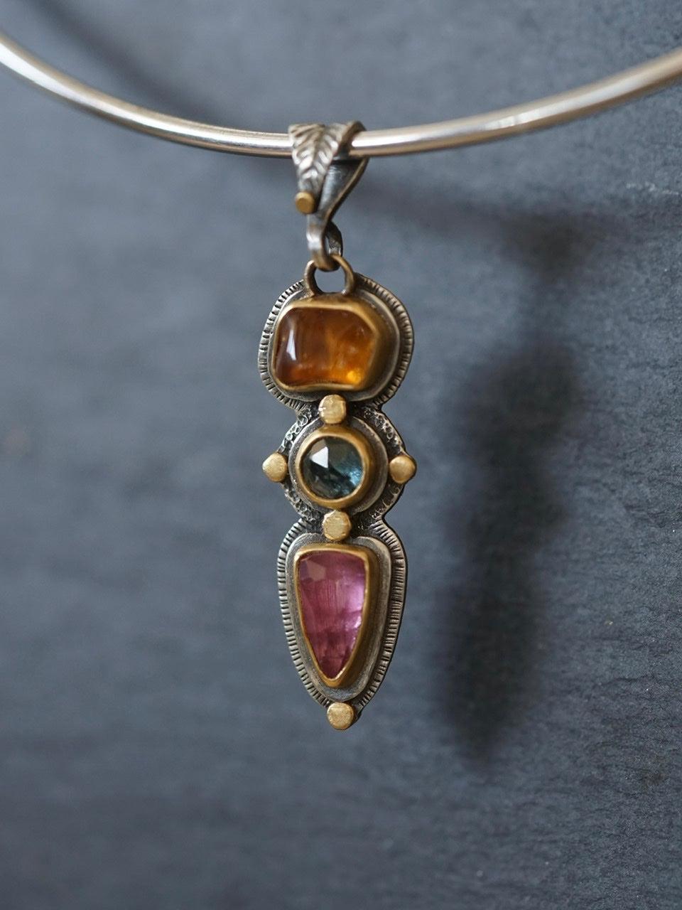 Tourmaline and sapphire pendant with gold accents