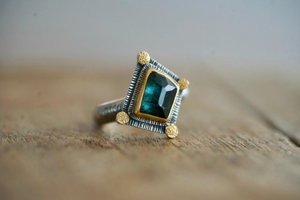 Irregularly shaped, teal blue, faceted tourmaline and 22k gold statement ring, size 7.75
