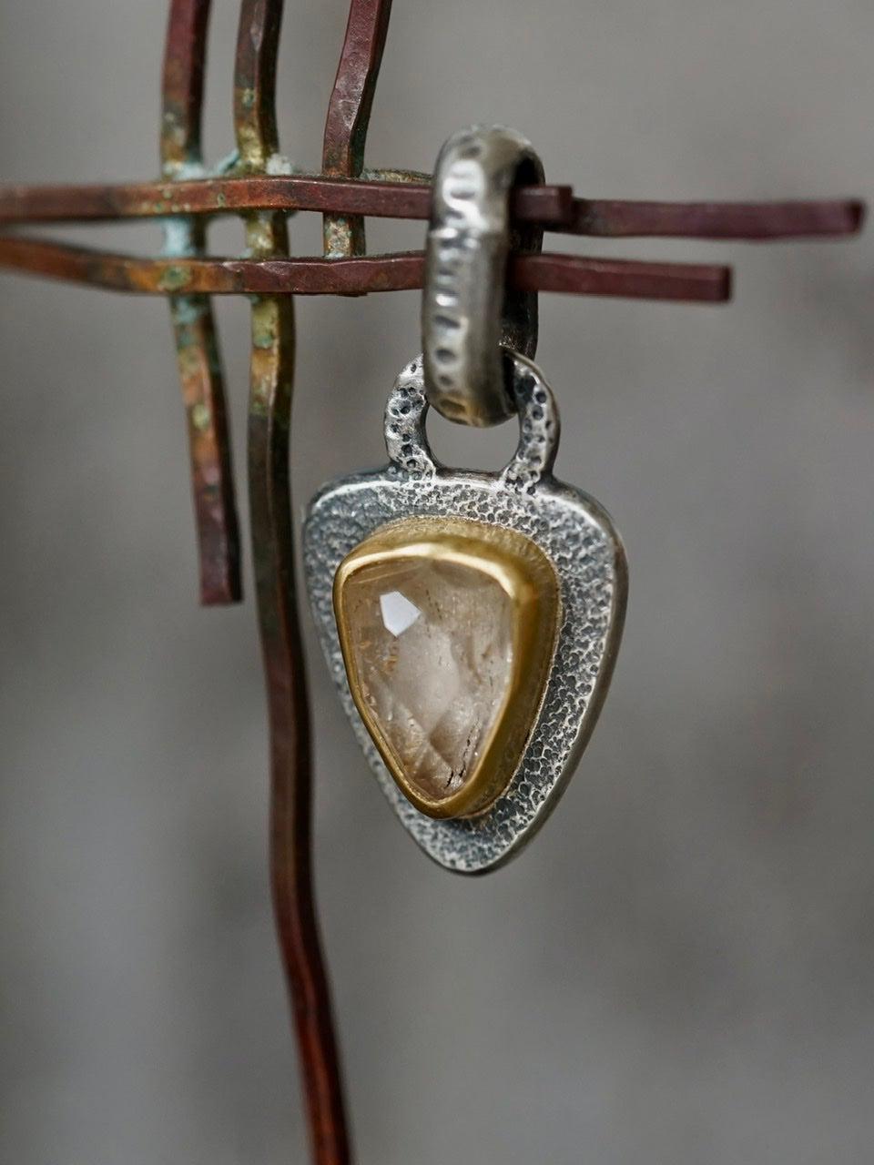 Topaz and 22k gold pendant