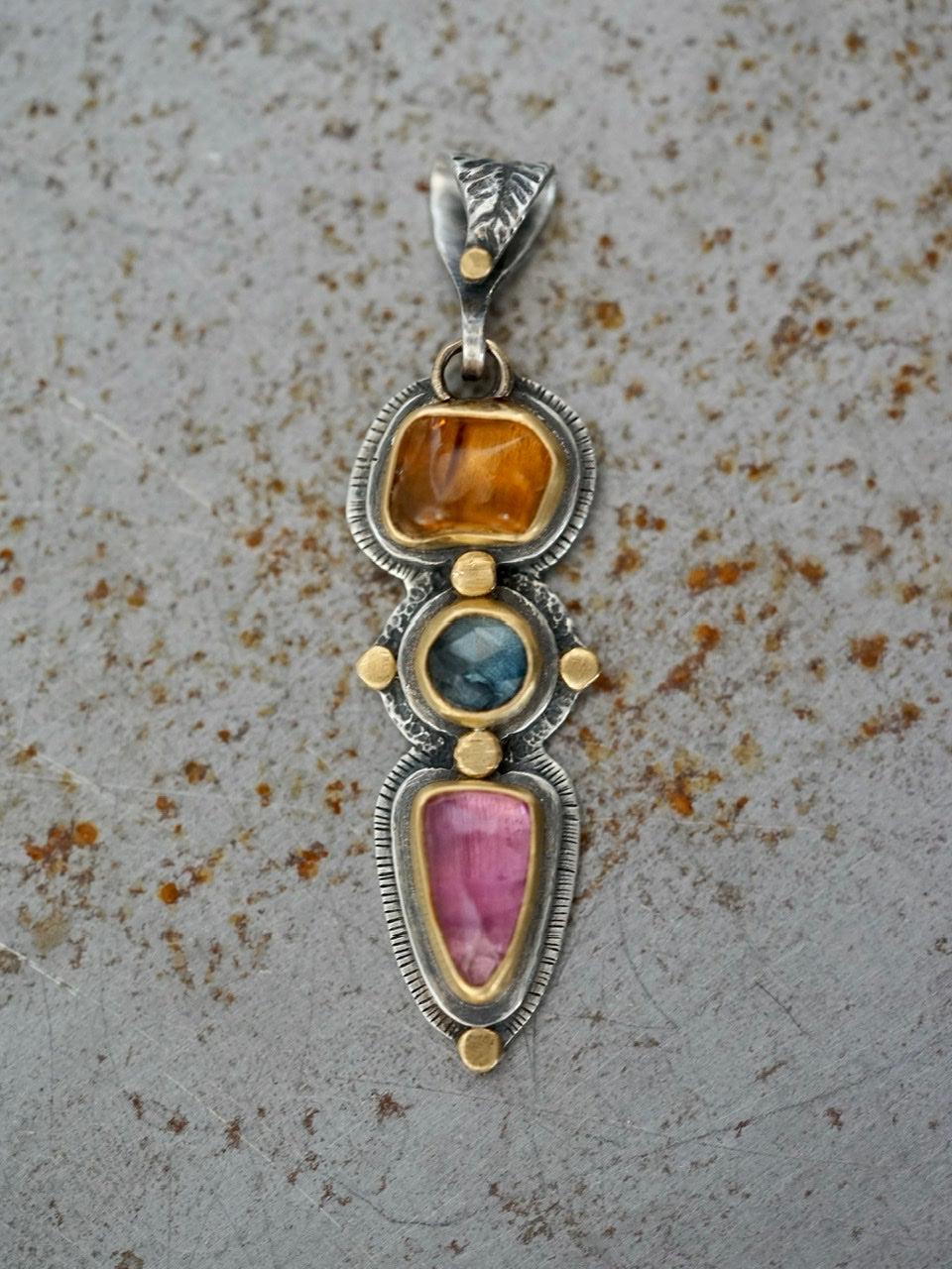 Tourmaline and sapphire pendant with gold accents