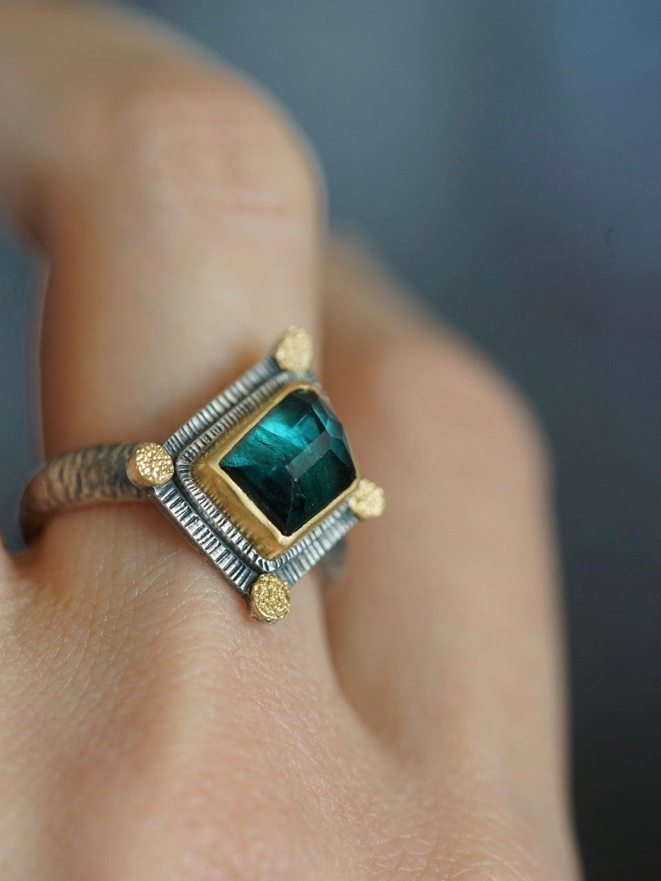 Irregularly shaped, teal blue, faceted tourmaline and 22k gold statement ring, size 7.75