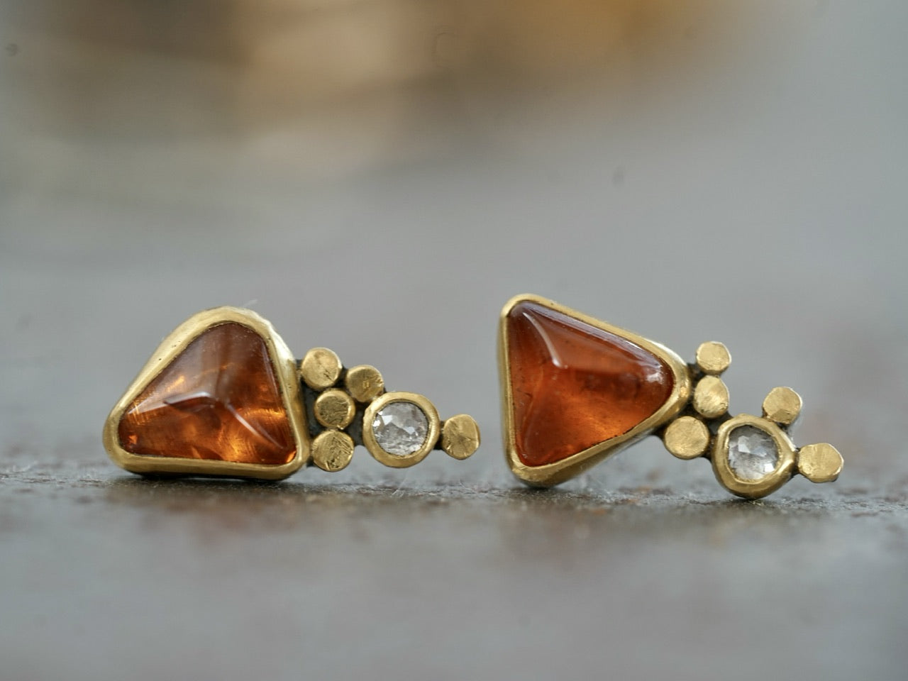 Hessonite garnet and diamond post earrings