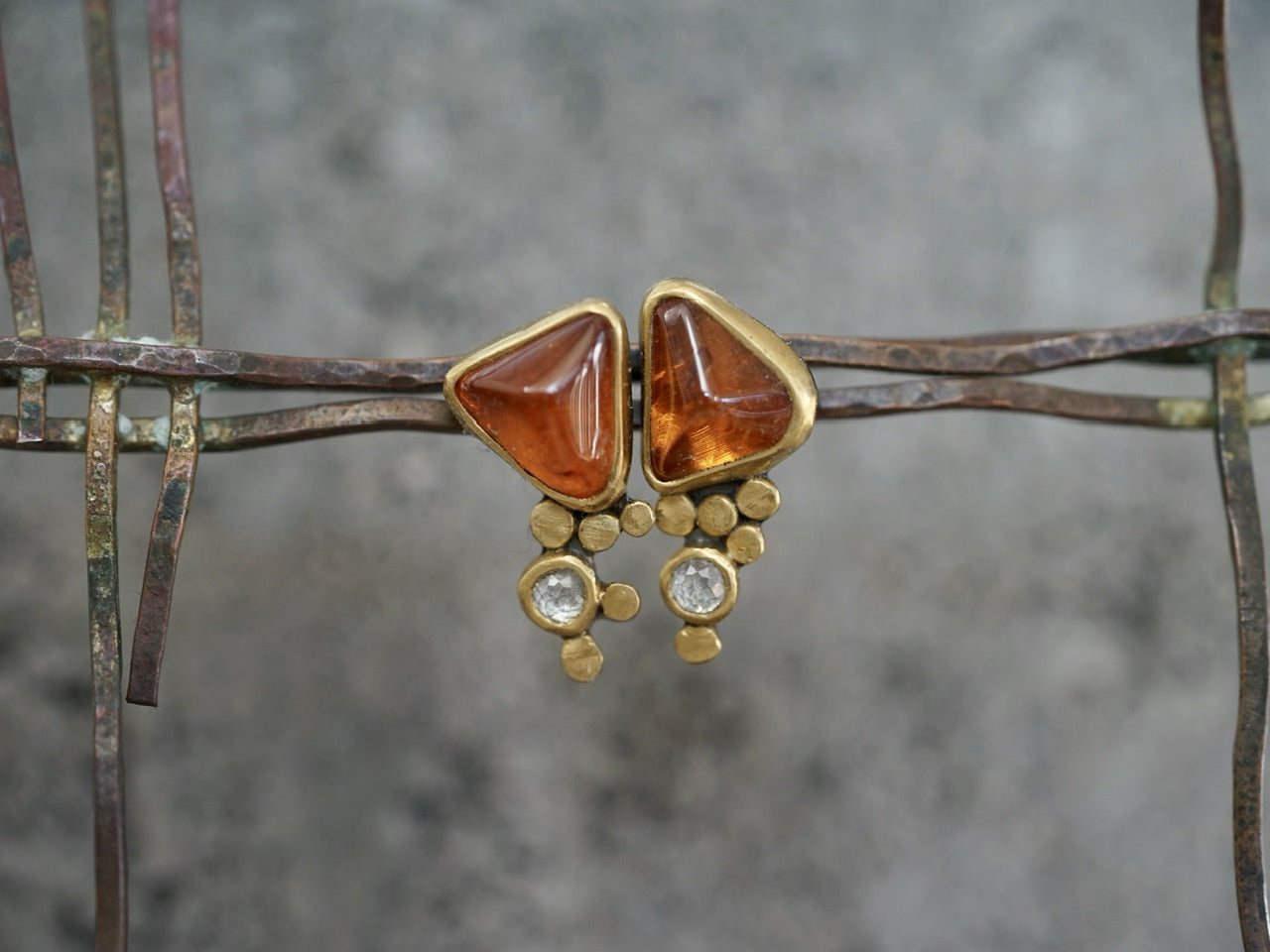 Hessonite garnet and diamond post earrings