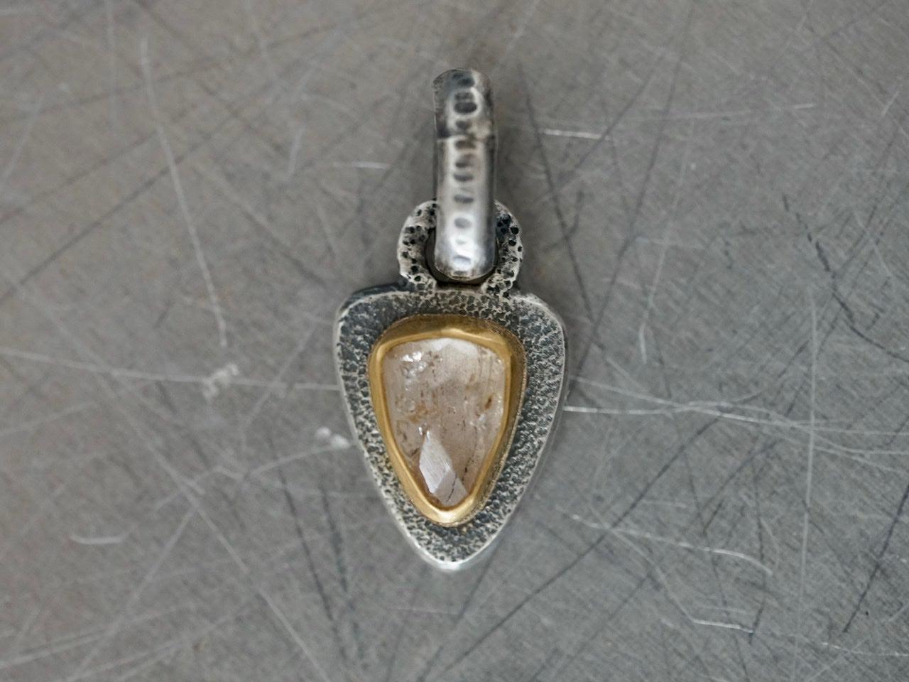 Topaz and 22k gold pendant