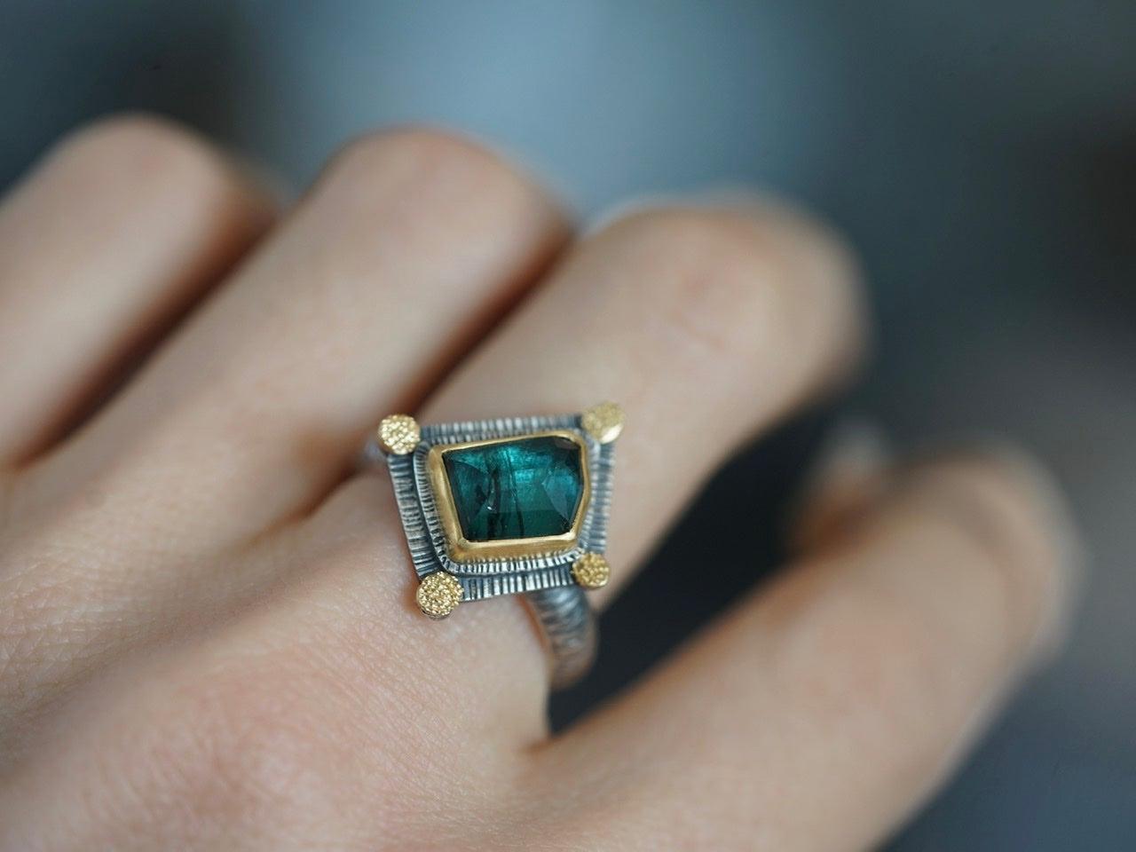 Irregularly shaped, teal blue, faceted tourmaline and 22k gold statement ring, size 7.75