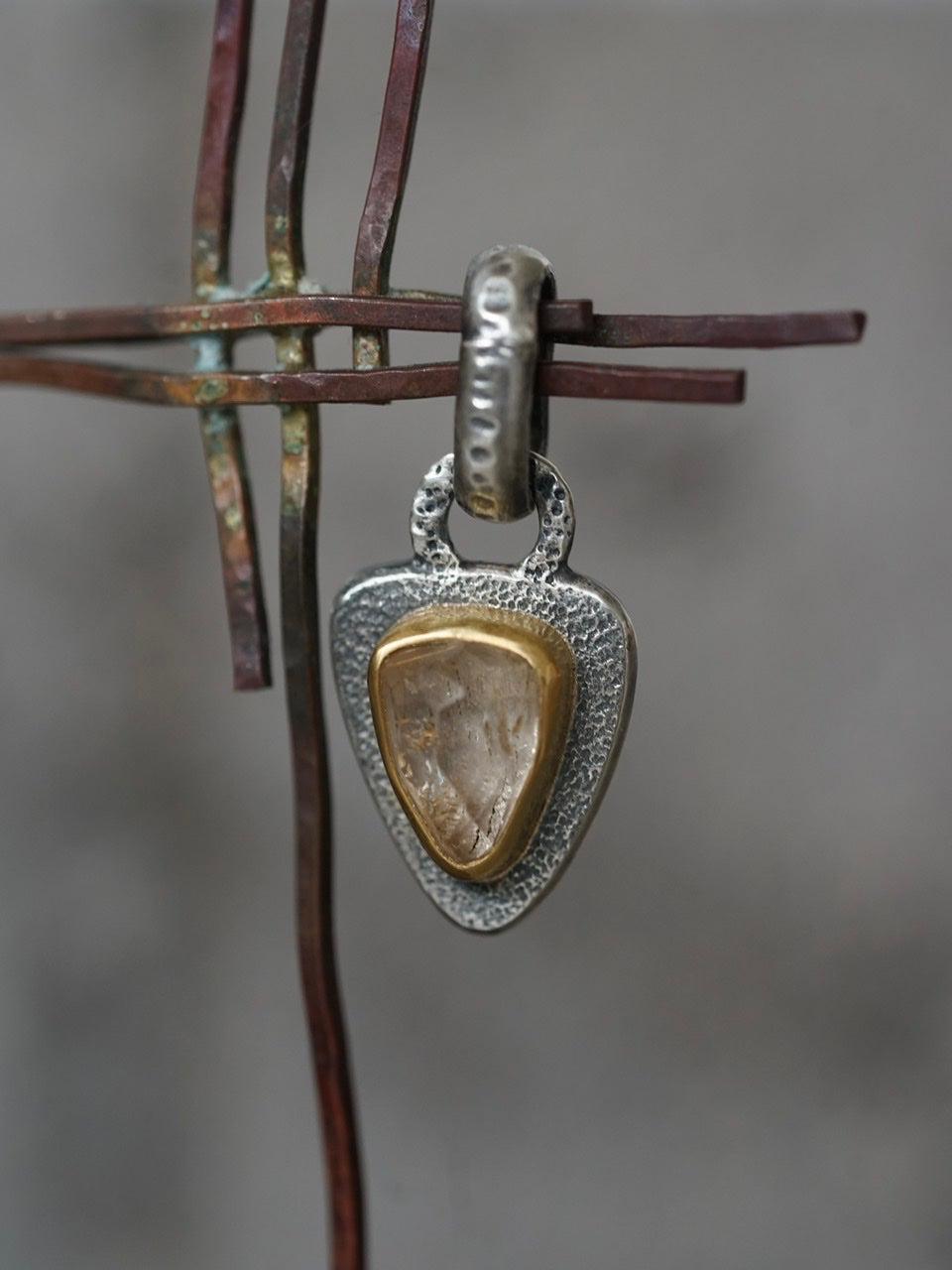 Topaz and 22k gold pendant