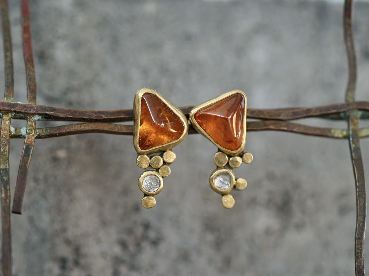 Hessonite garnet and diamond post earrings