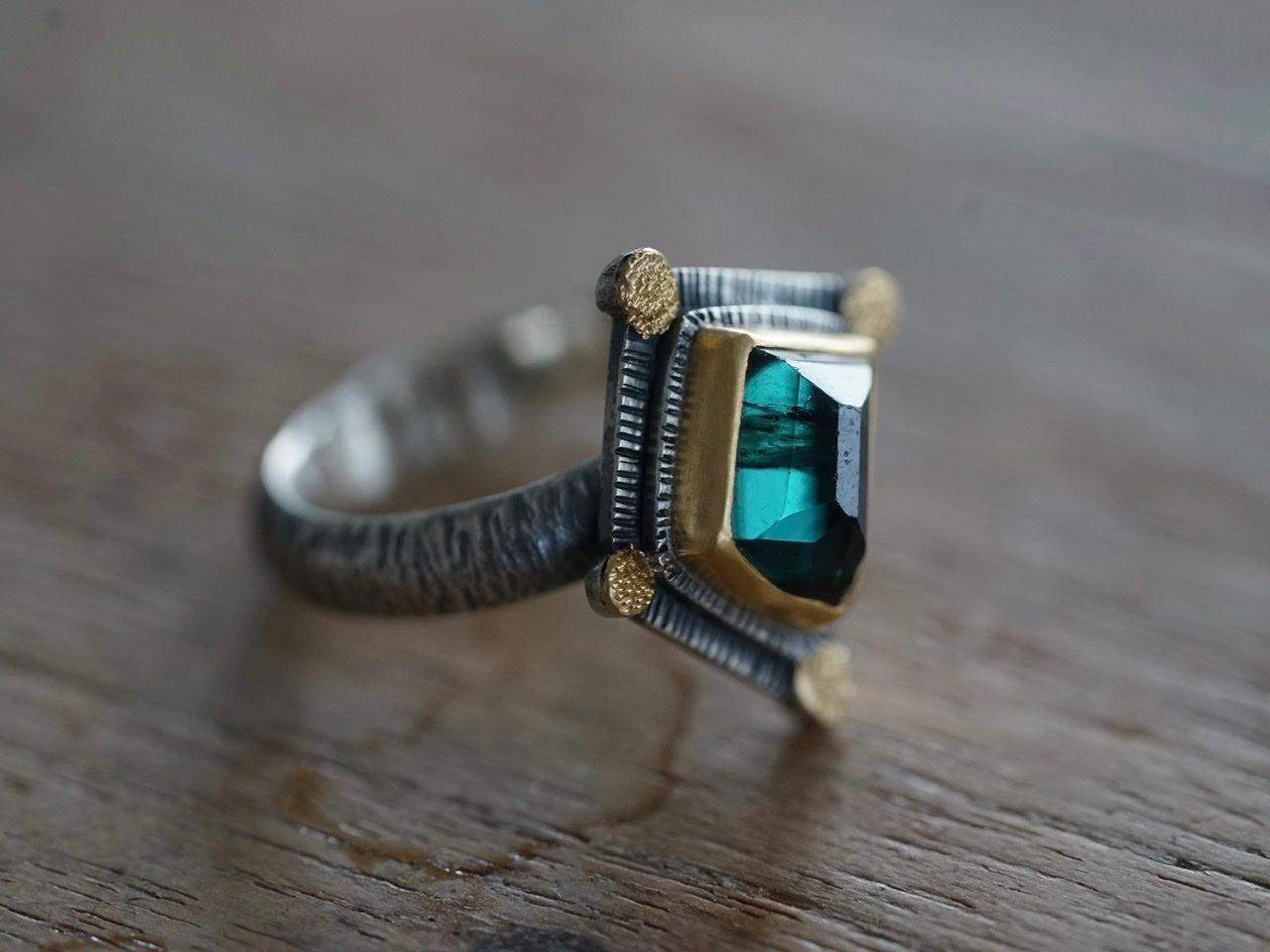 Irregularly shaped, teal blue, faceted tourmaline and 22k gold statement ring, size 7.75