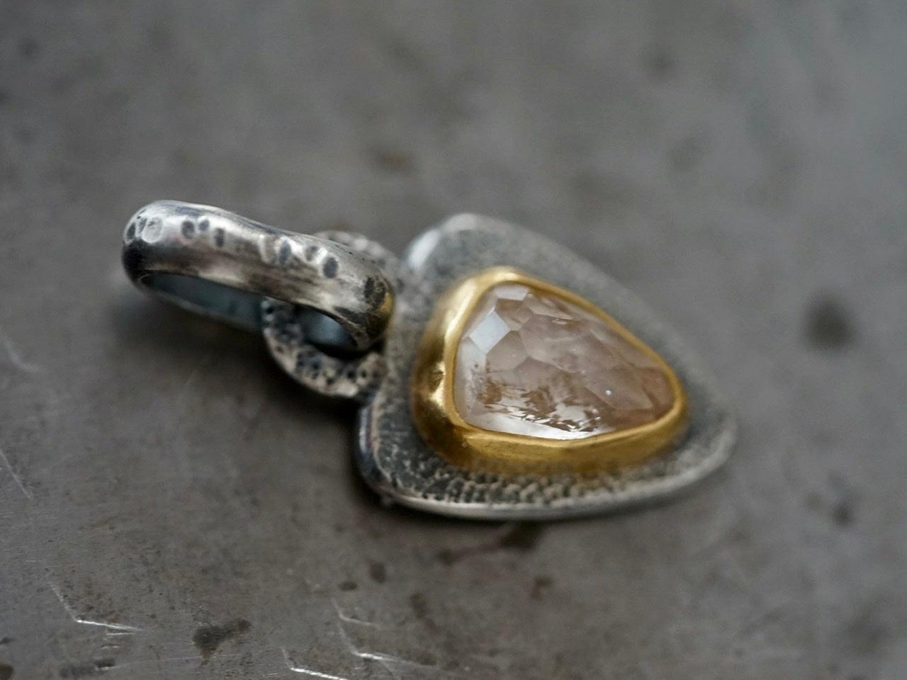 Topaz and 22k gold pendant