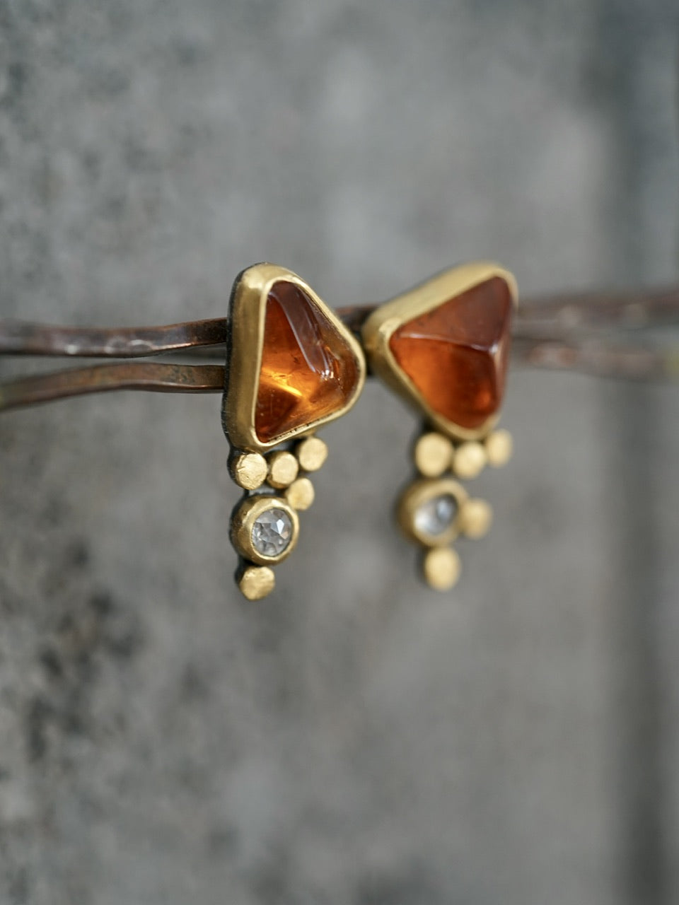 Hessonite garnet and diamond post earrings