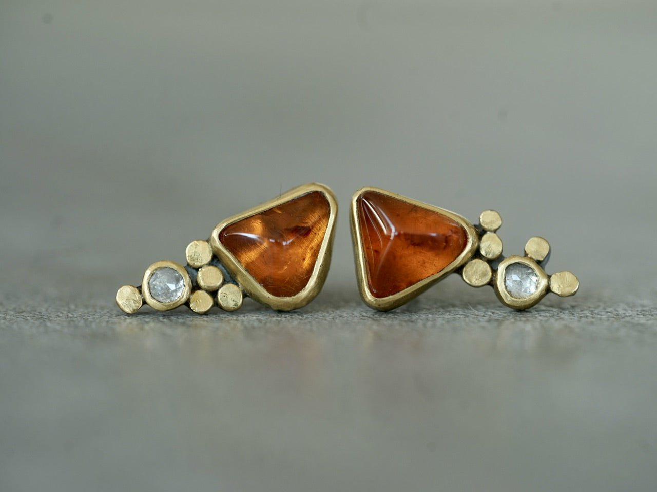 Hessonite garnet and diamond post earrings